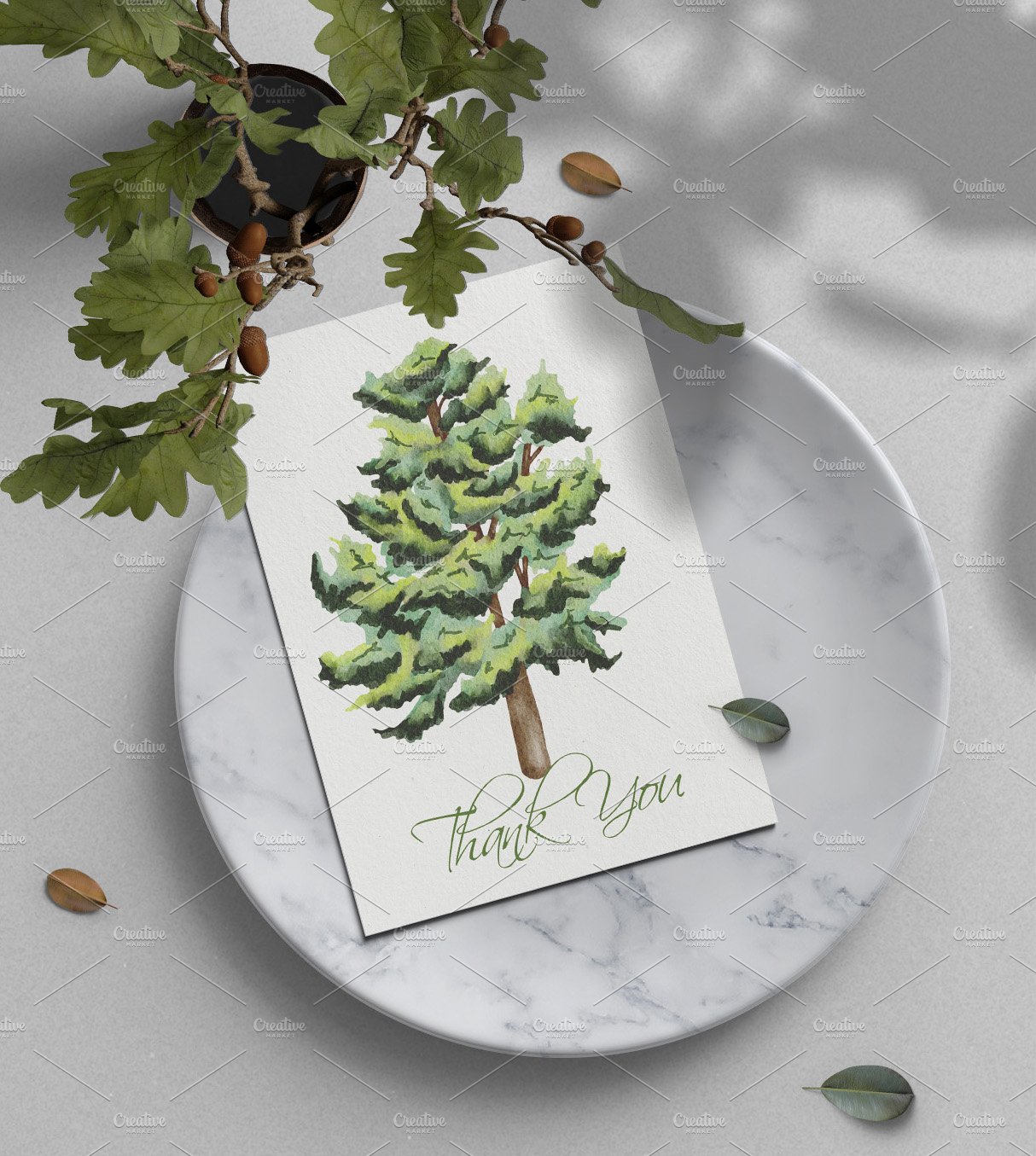 Thank card with a green tree on it.