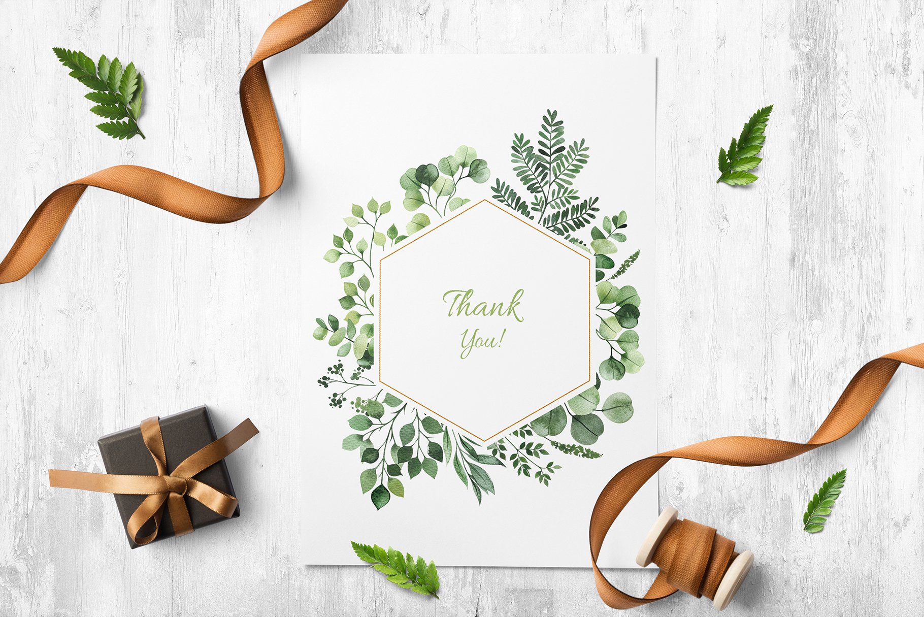Thank card with greenery and ribbon.