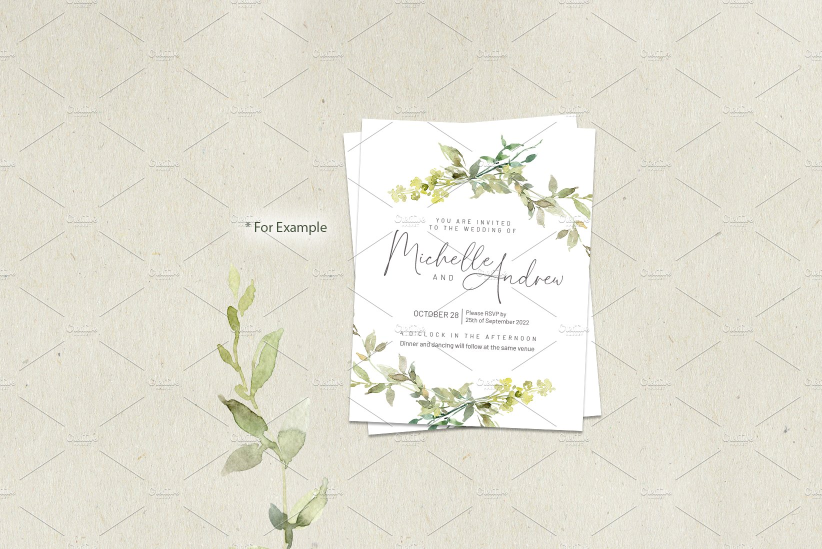 Wedding card with greenery on it.