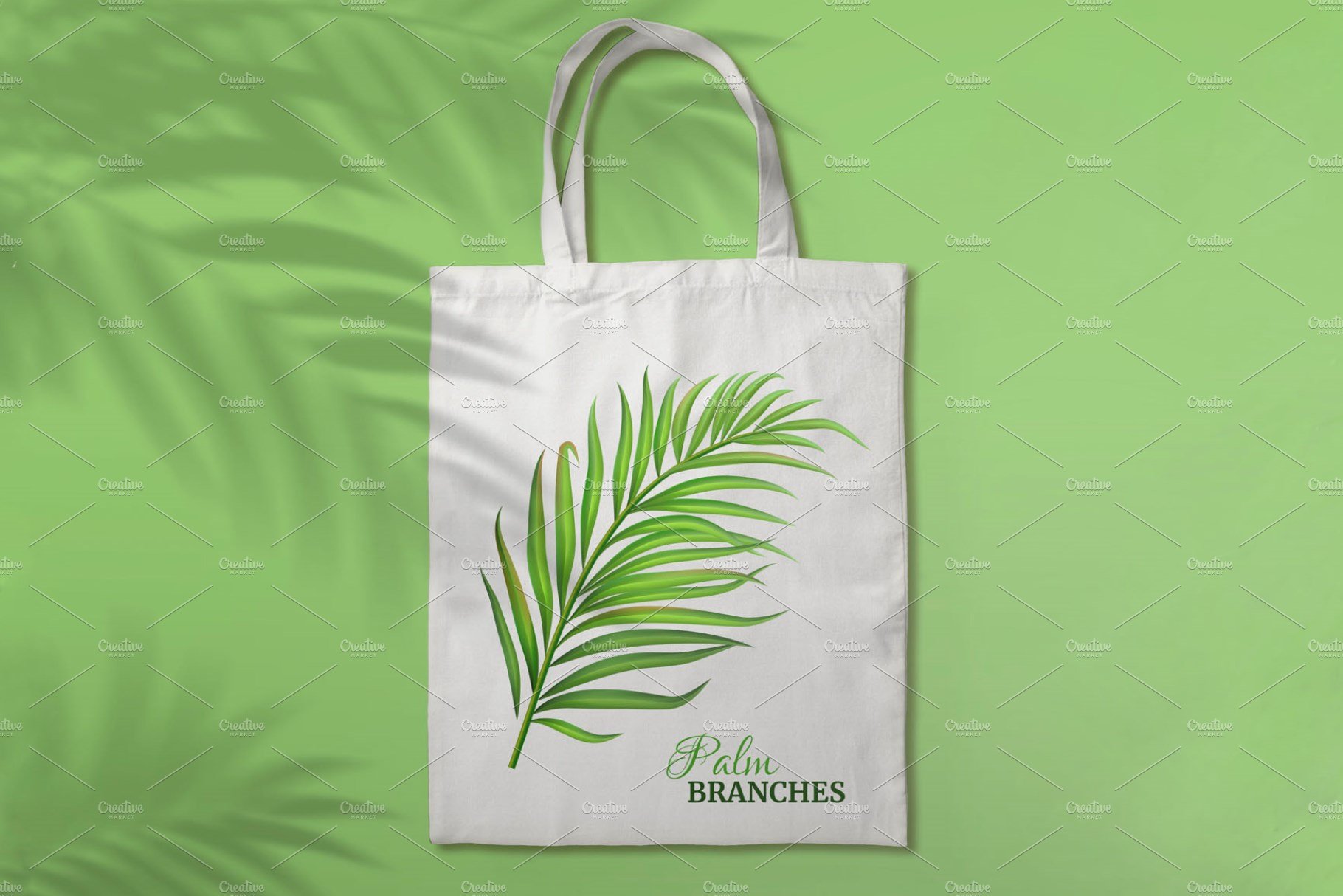 White bag with a green palm leaf on it.