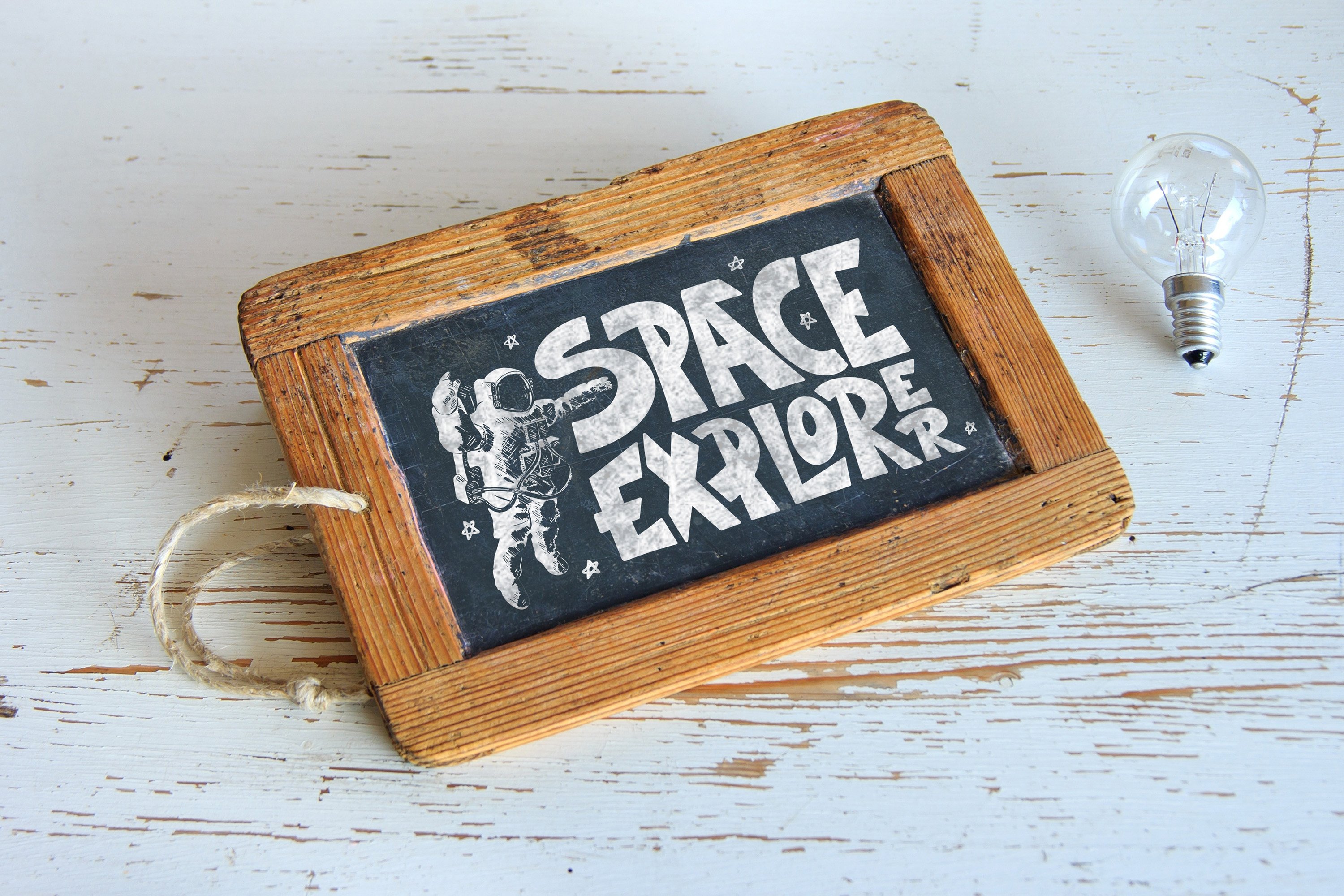 Chalkboard with the words space explorer written on it.