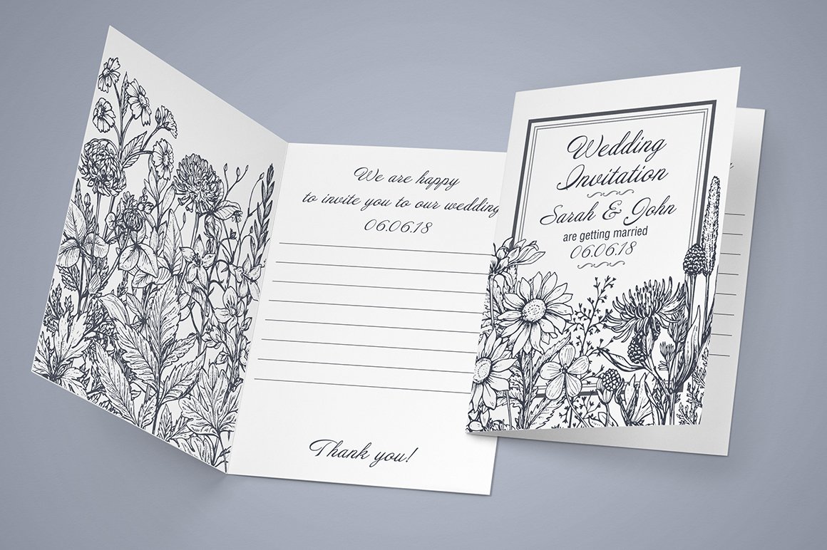 Wedding card with a floral design on it.