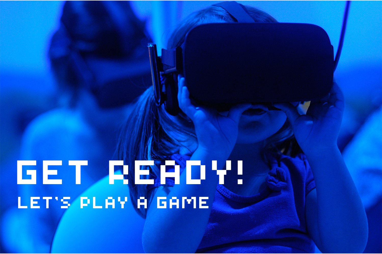 A little girl playing a video game with a vr headset.