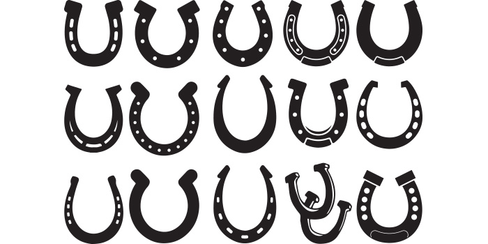 Set of black and white horseshoes on a white background.