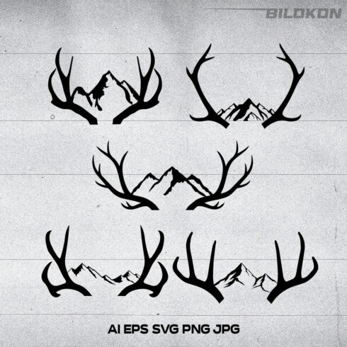 Set of deer antlers with mountains in the background.