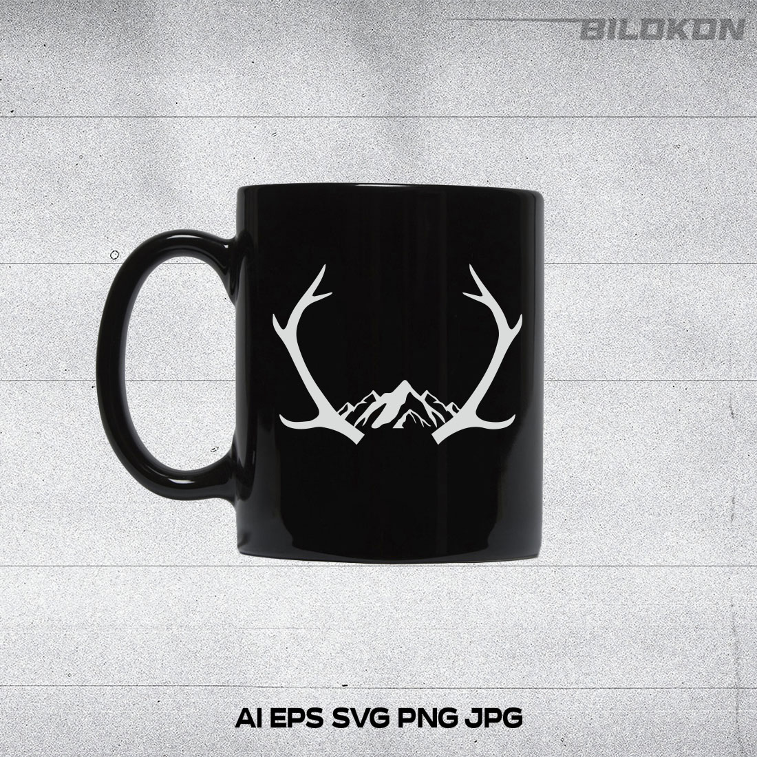 Black coffee mug with white deer antlers on it.