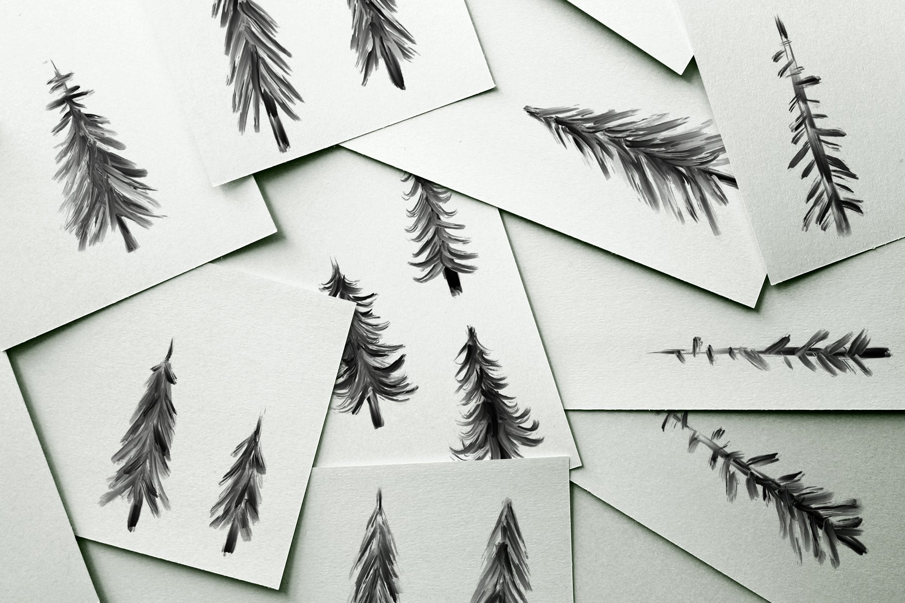 Bunch of cards with trees drawn on them.