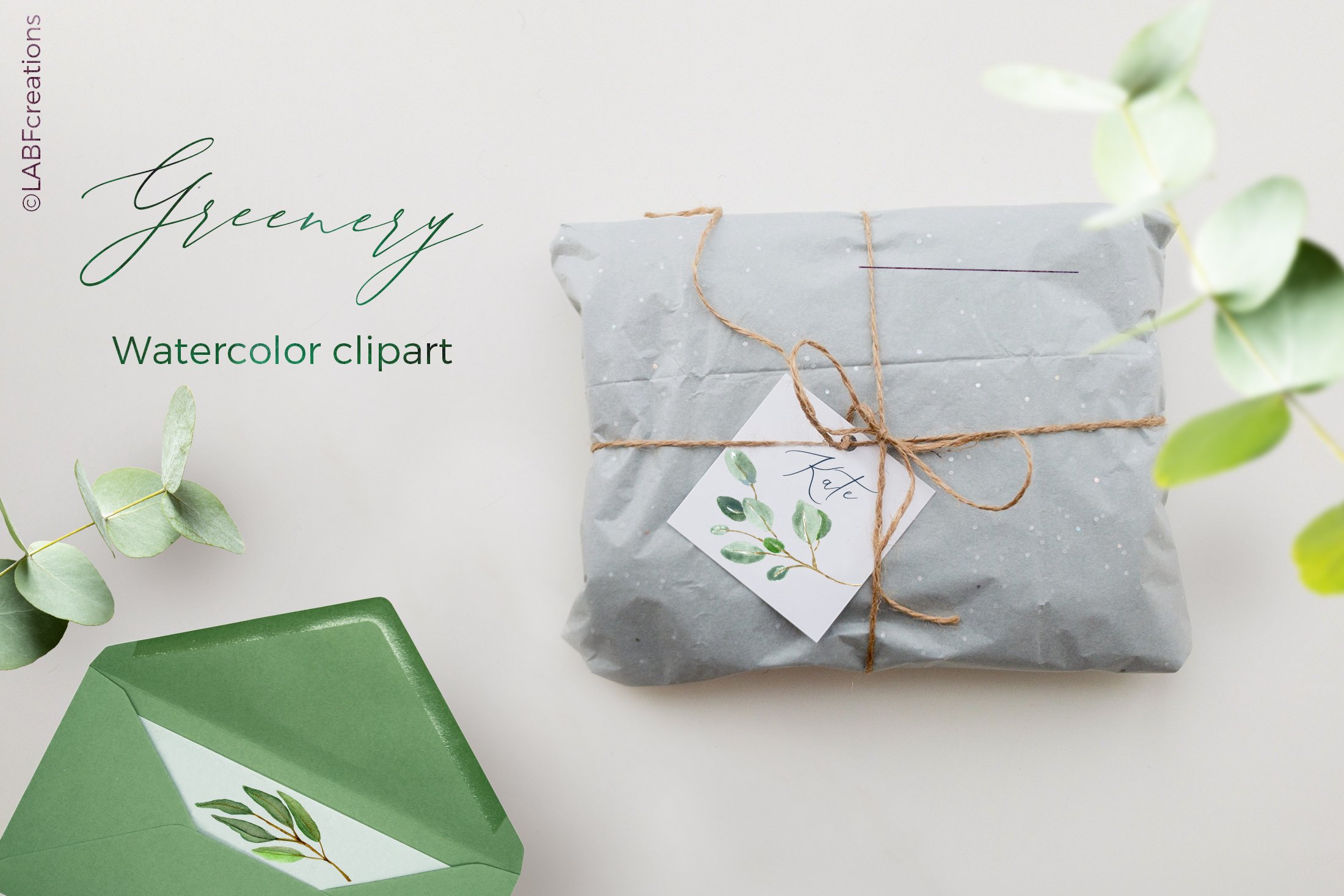 Present wrapped in gray paper next to a green box.