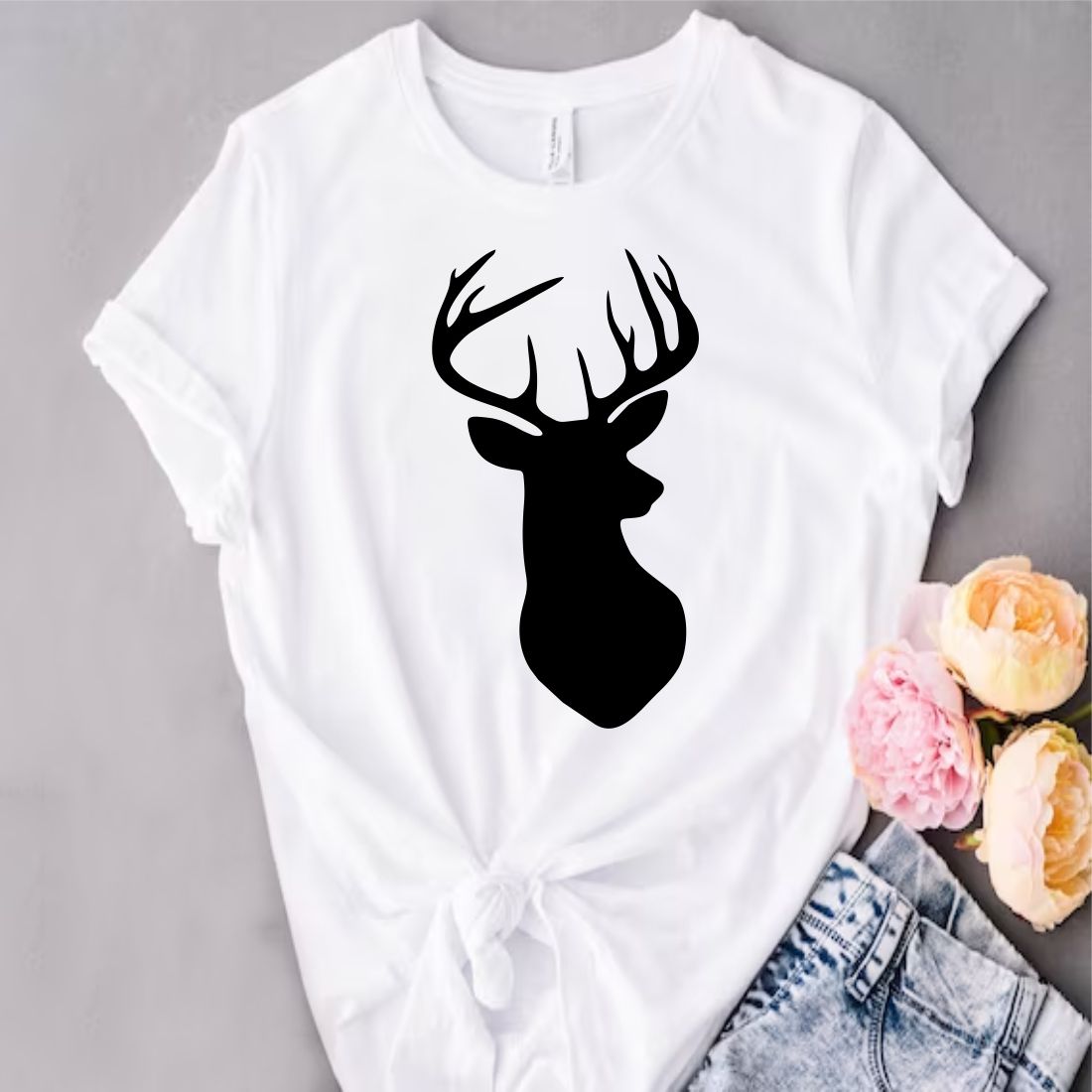T - shirt with a deer head on it.