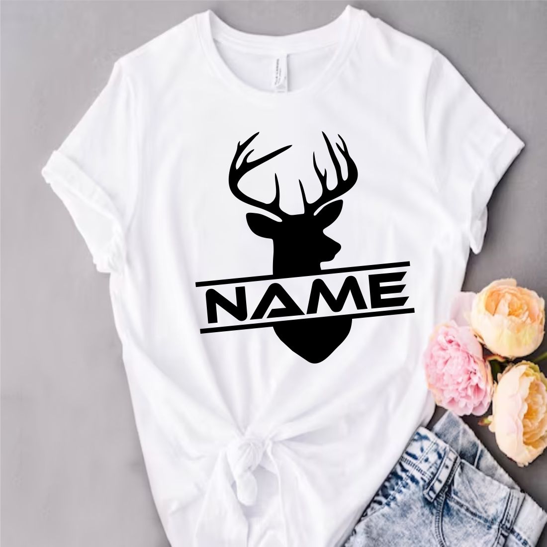 T - shirt with a deer head and name on it.