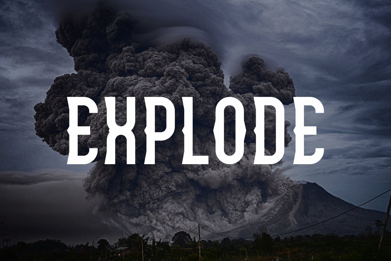 A black and white photo of a volcano with the word explode in front of it.