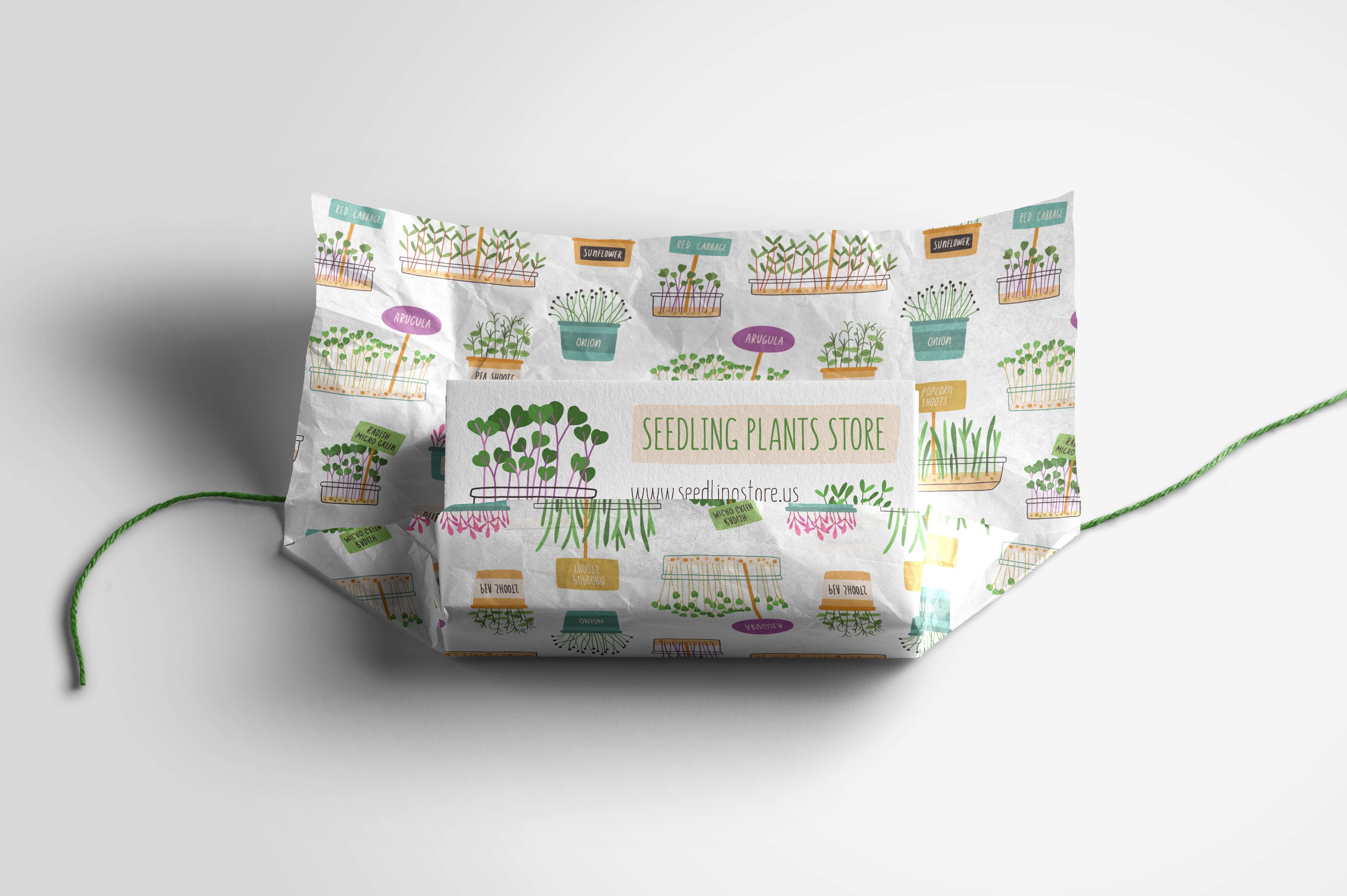 Paper bag with plants printed on it.