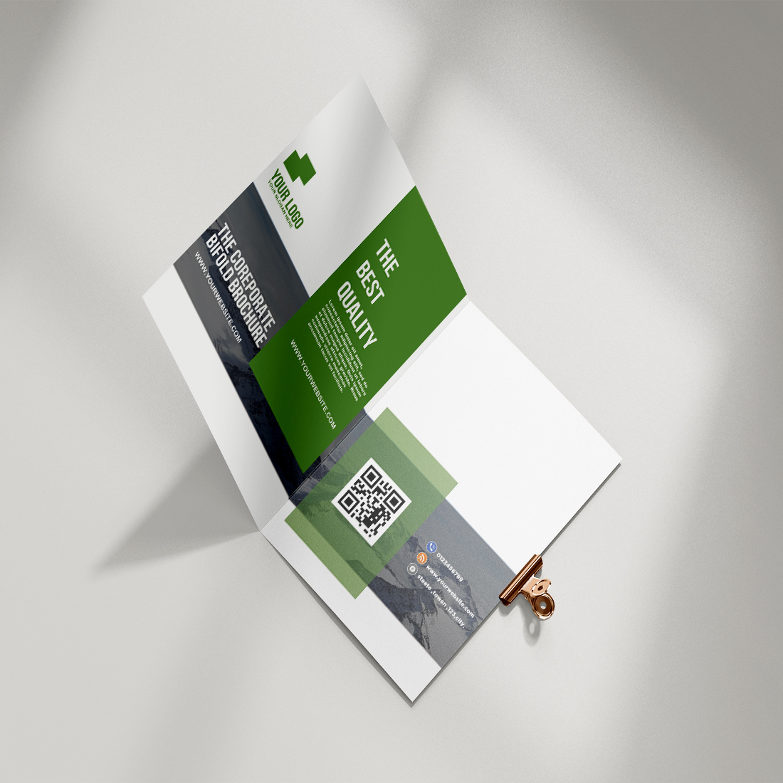 Green and white brochure with a key on it.