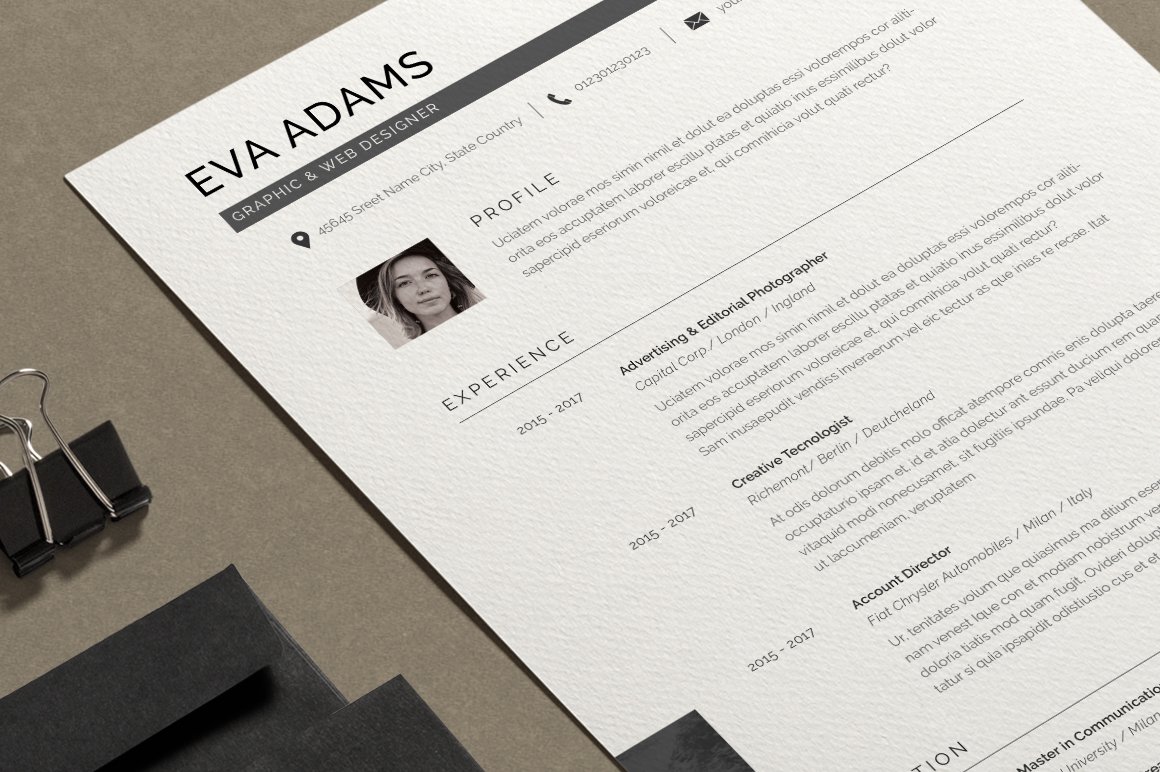 Professional resume is displayed on a desk.