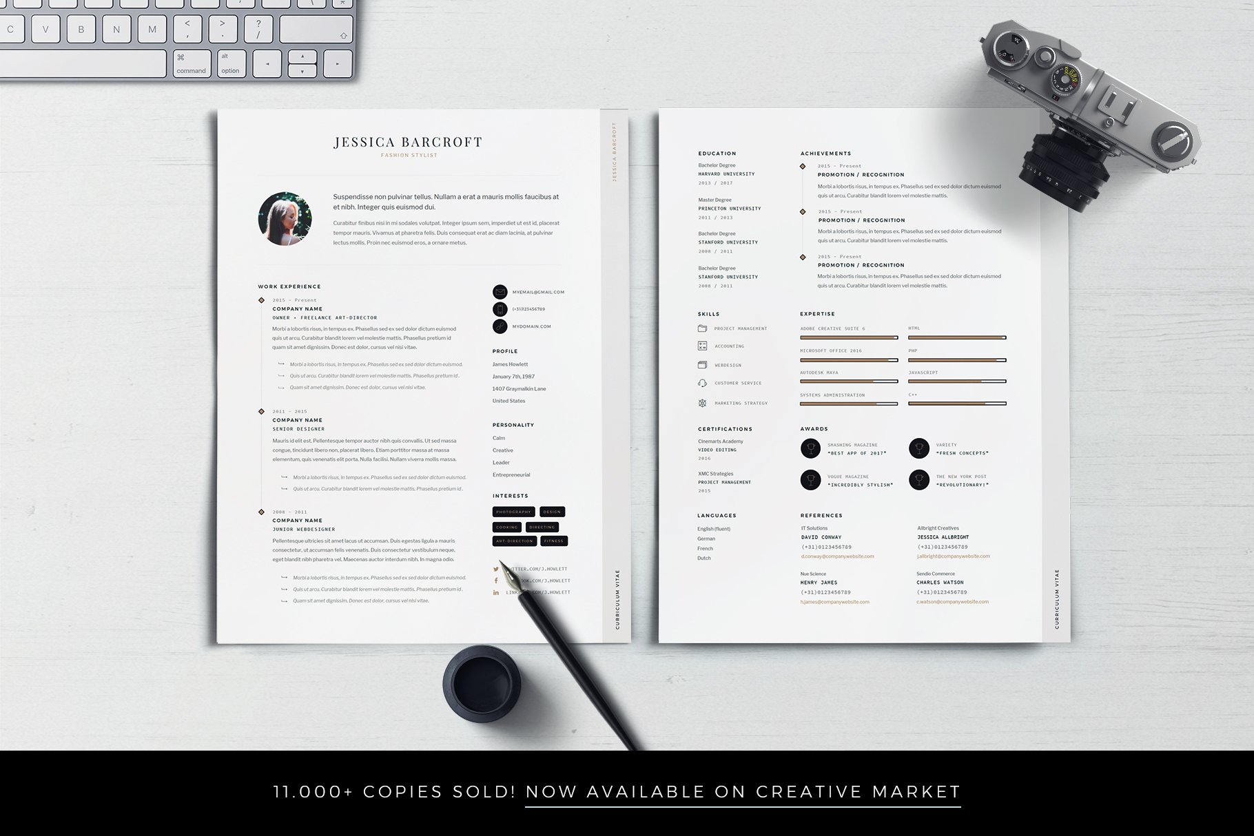 Professional resume on a desk with a camera and keyboard.