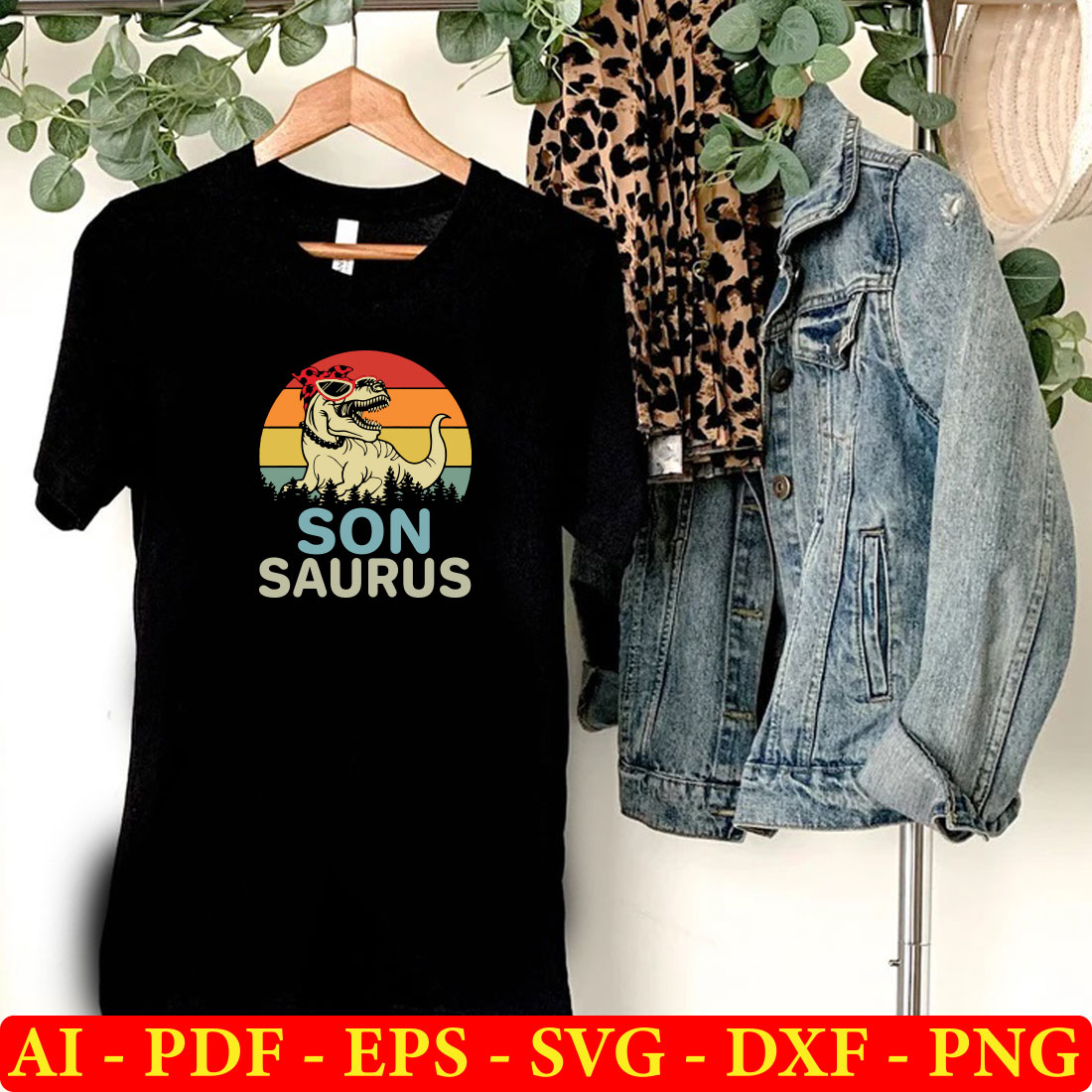 T - shirt that says son sauris on it next to a pair.