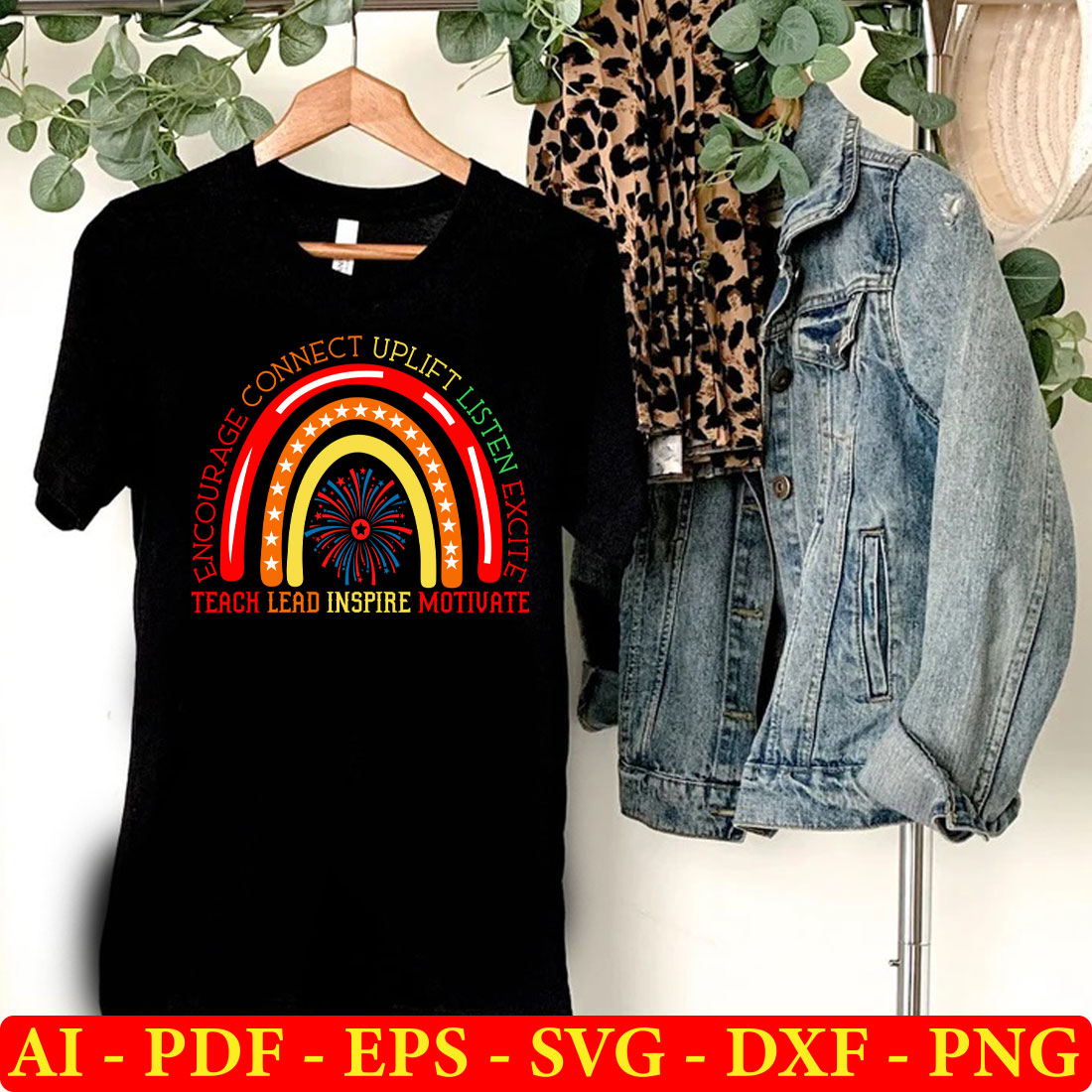 Black shirt with a rainbow on it next to a pair of denim jackets.