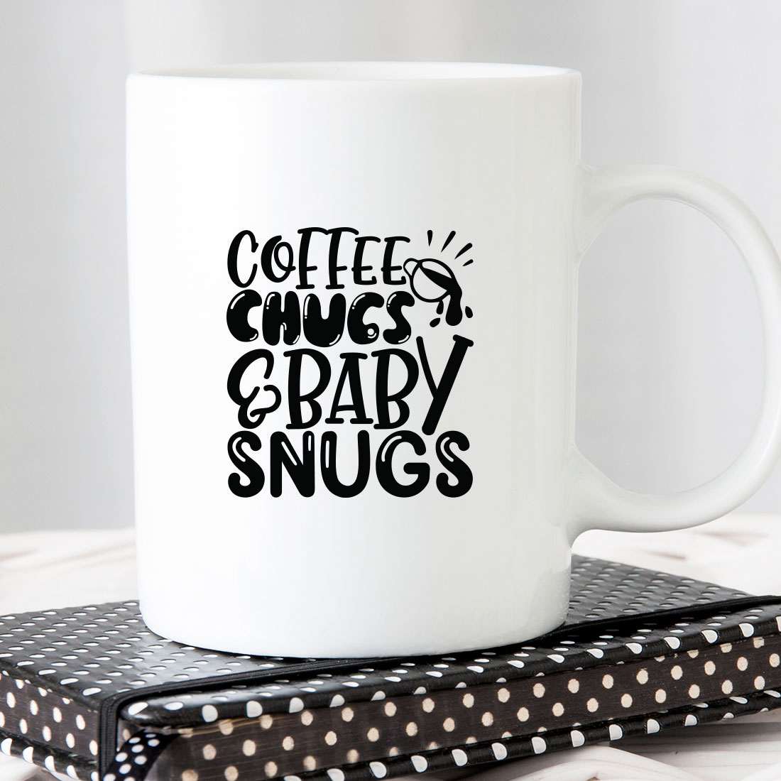 Coffee mug that says coffee hugs and baby snugs.