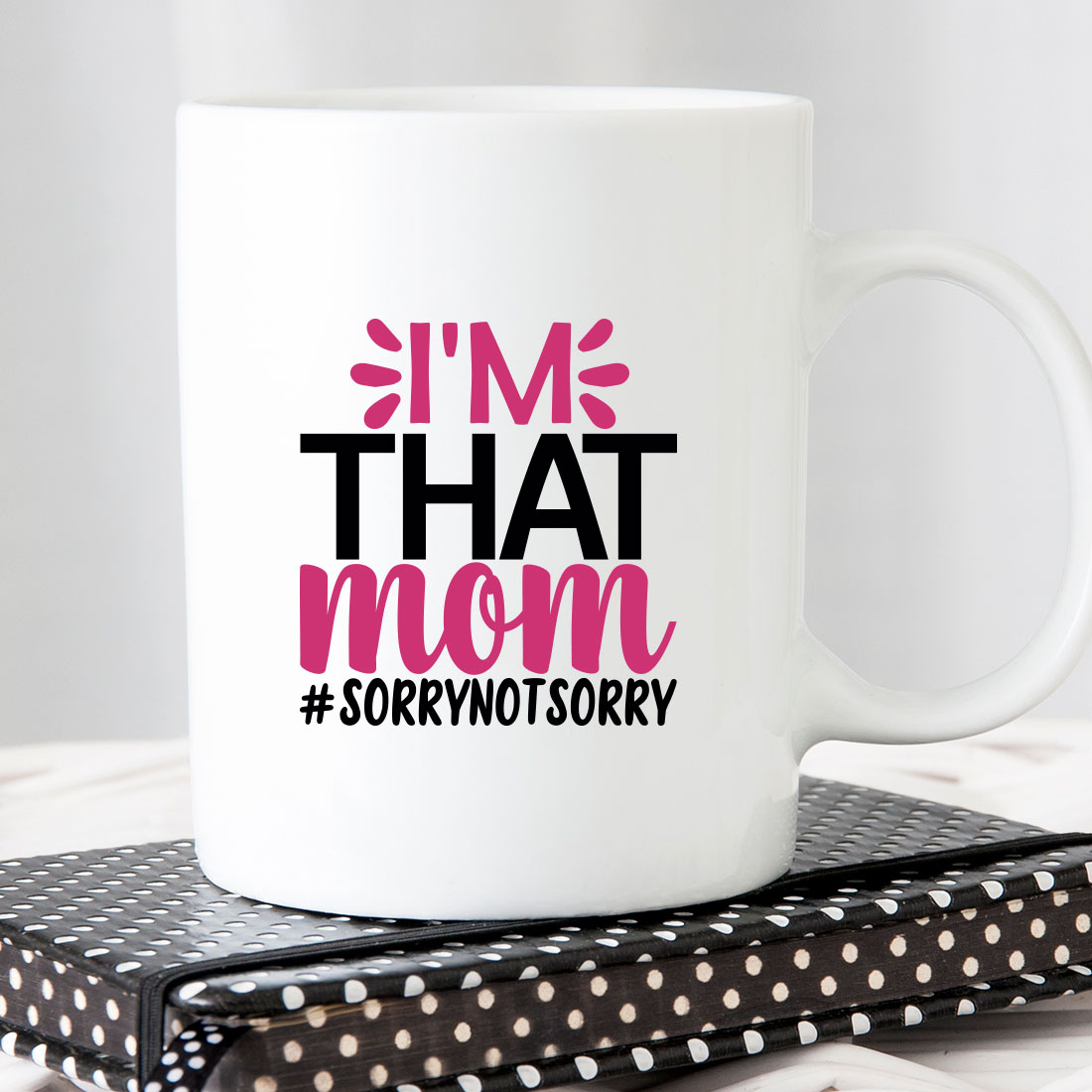 White coffee mug that says i'm that mom.