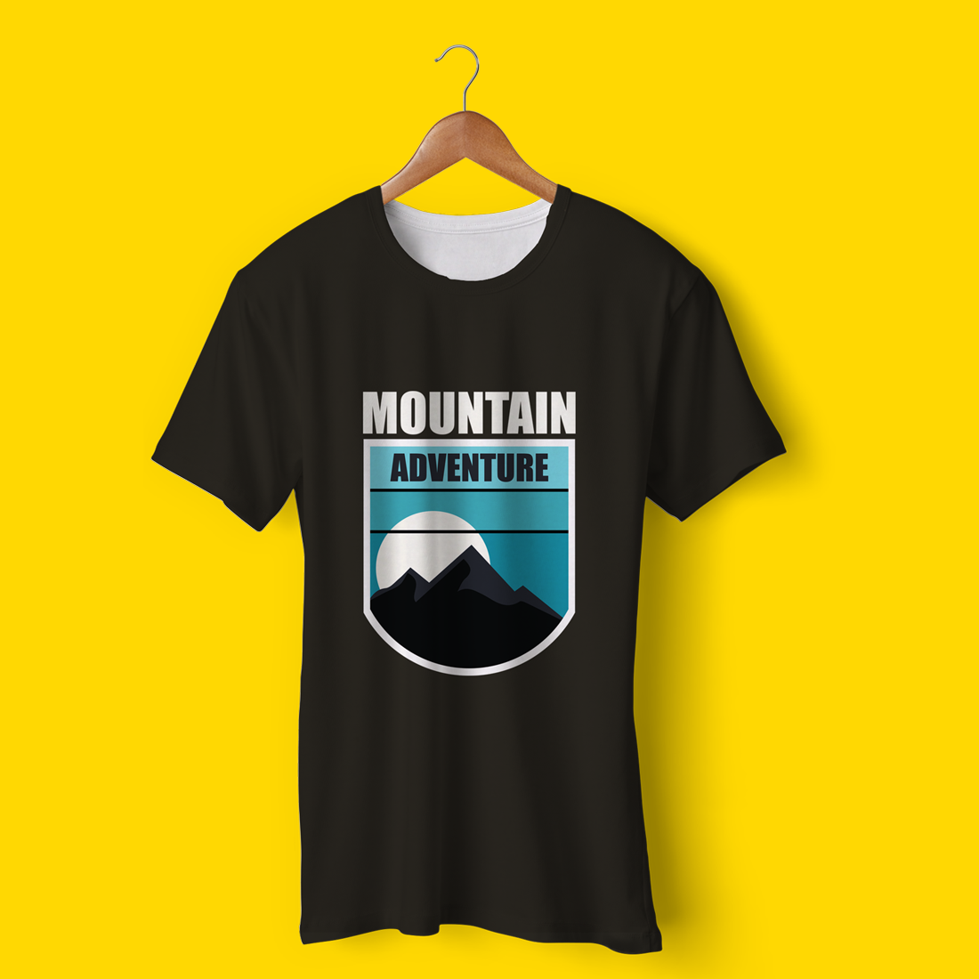 Black t - shirt that says mountain adventure on it.