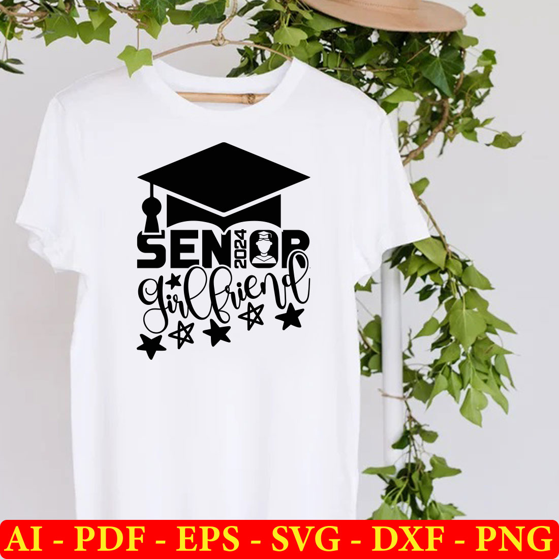 White shirt with a black graduation cap on it.