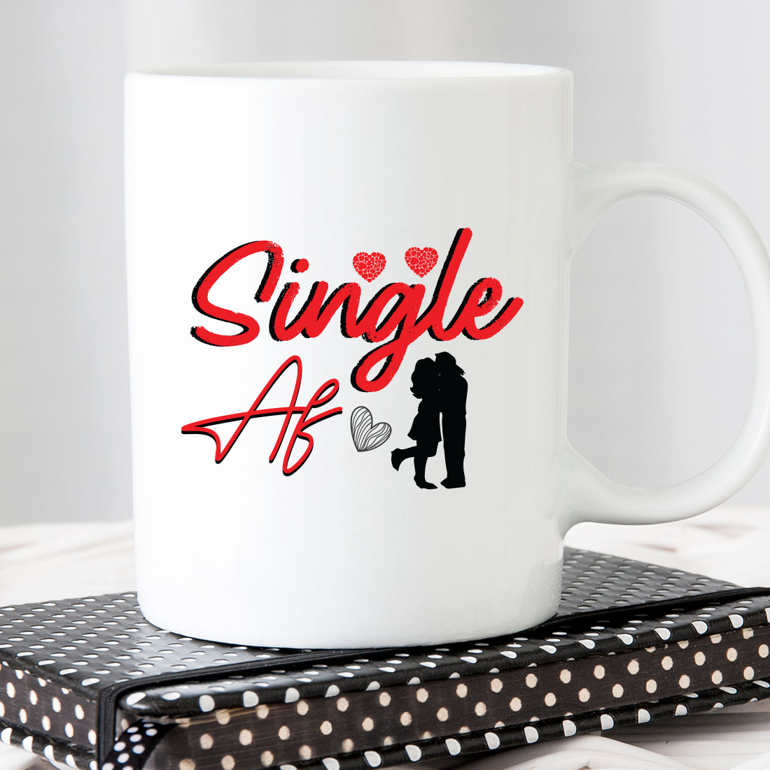 White coffee mug with the words single af on it.