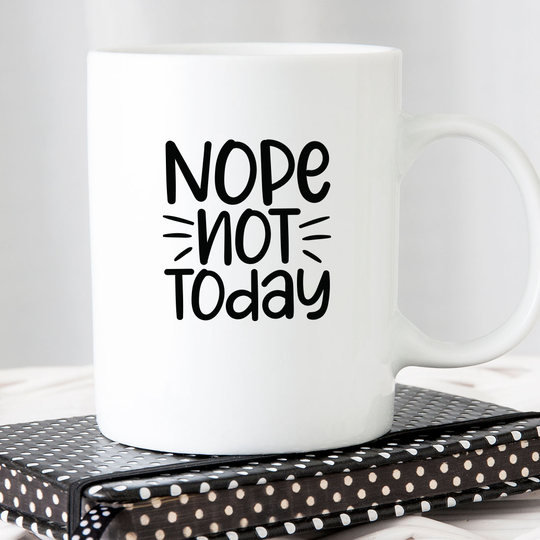 White coffee mug that says nope not today.