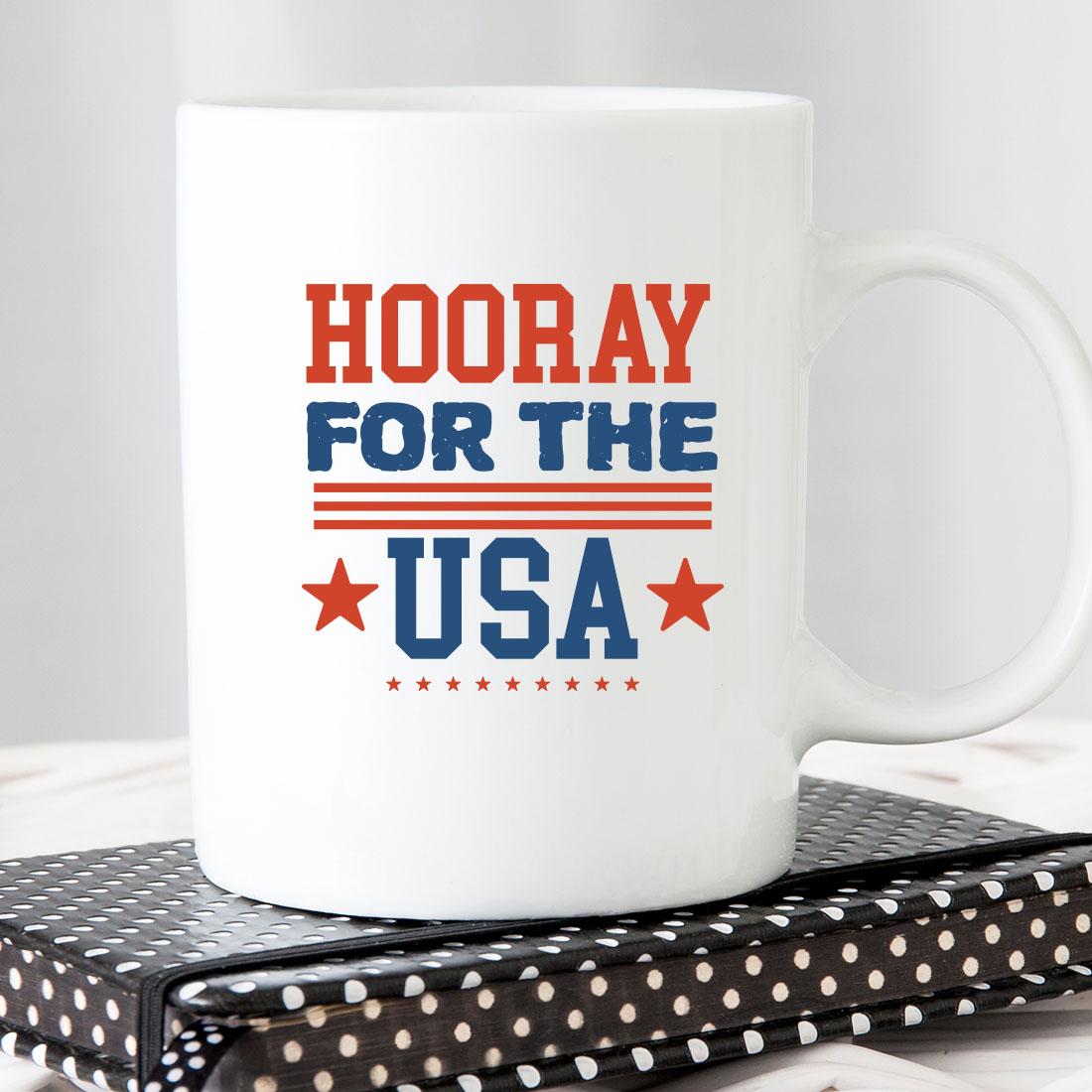 White coffee mug with the words hooray for the usa on it.