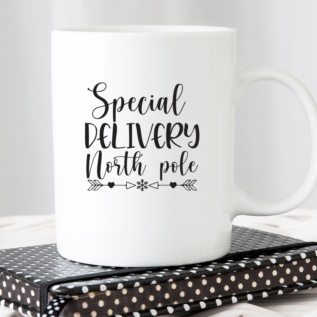 White coffee mug that says special delivery north pole.