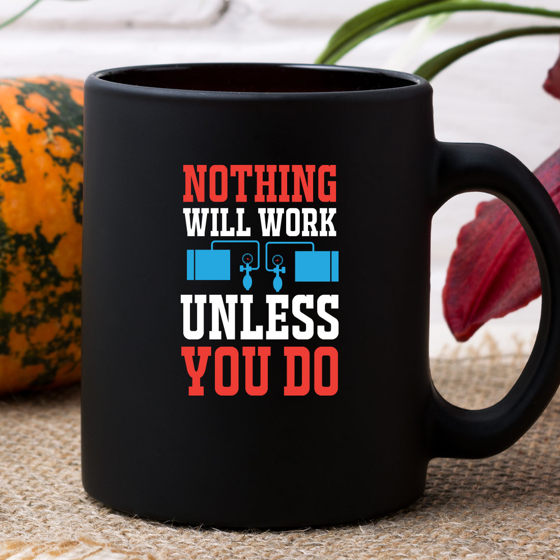 Black coffee mug that says nothing will work unless you do.