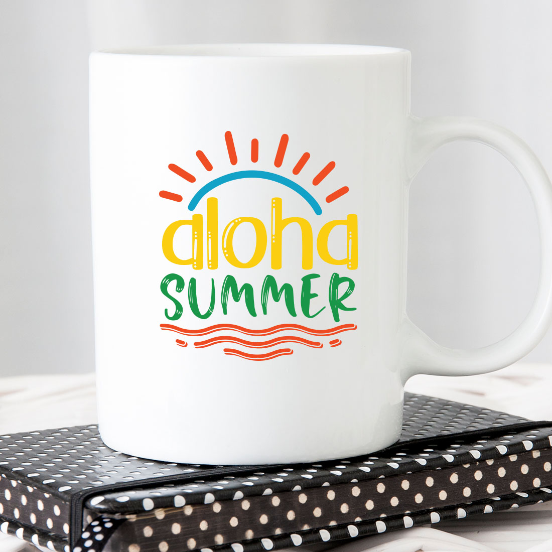 White coffee mug with the words aloha summer on it.
