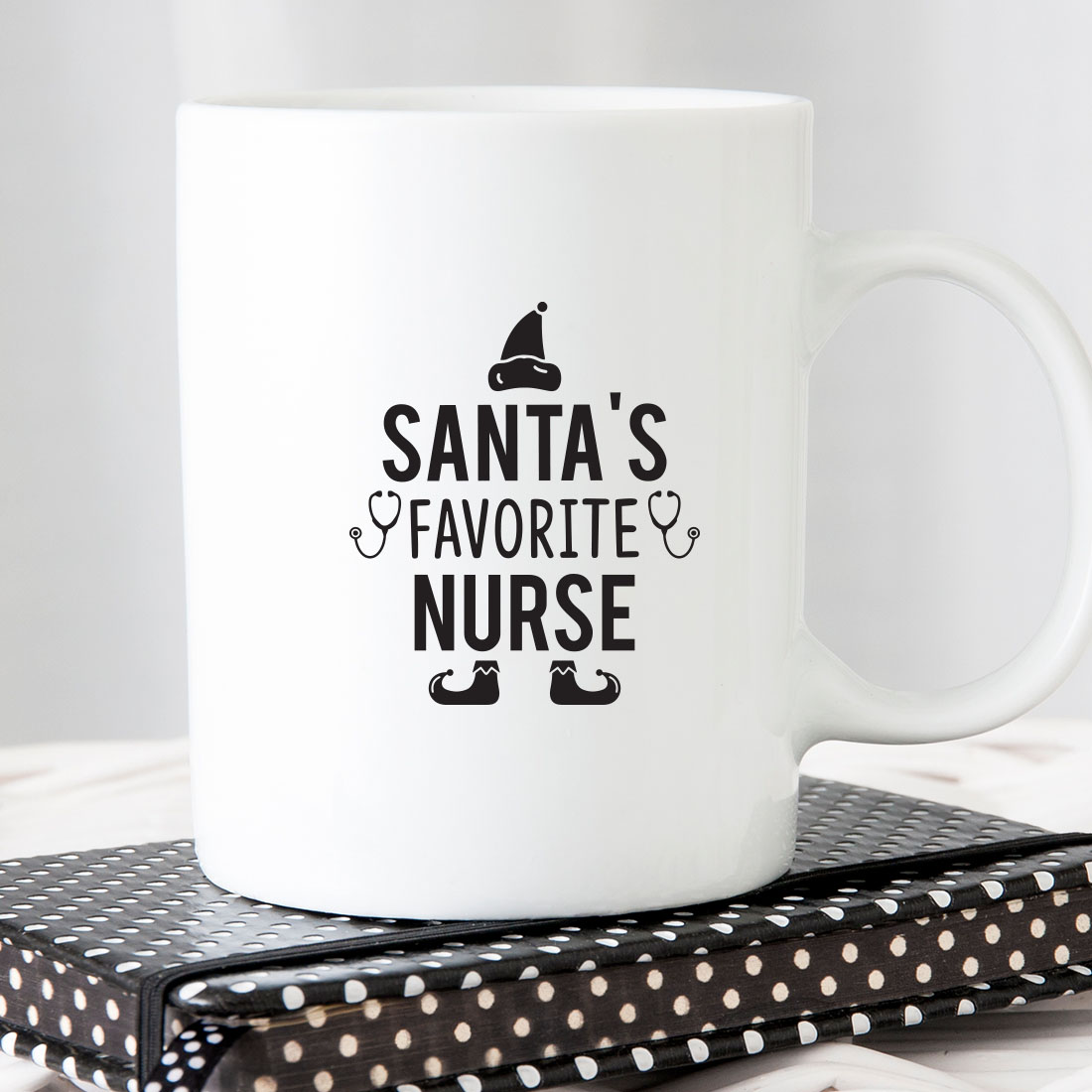 White coffee mug that says santa's favorite nurse.