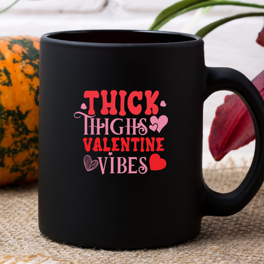 Black coffee mug that says thick thighs valentine vibes.