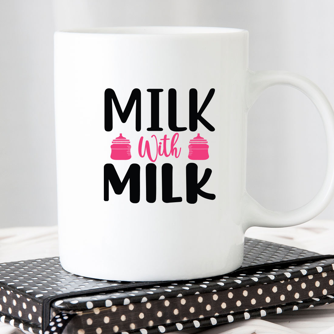 White coffee mug that says milk with milk.