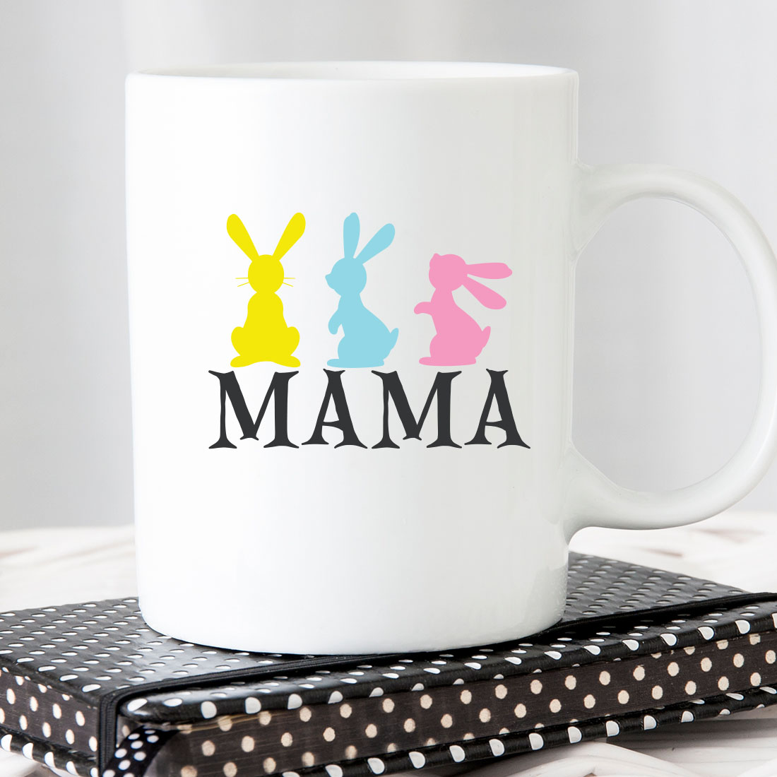 White coffee mug with the word mama printed on it.