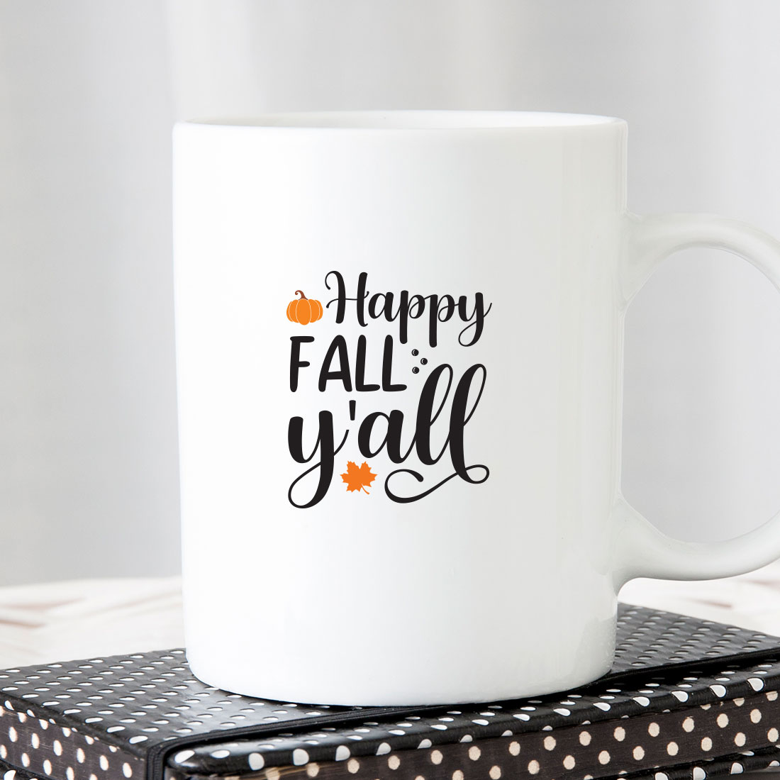 White coffee mug that says happy fall y'all.