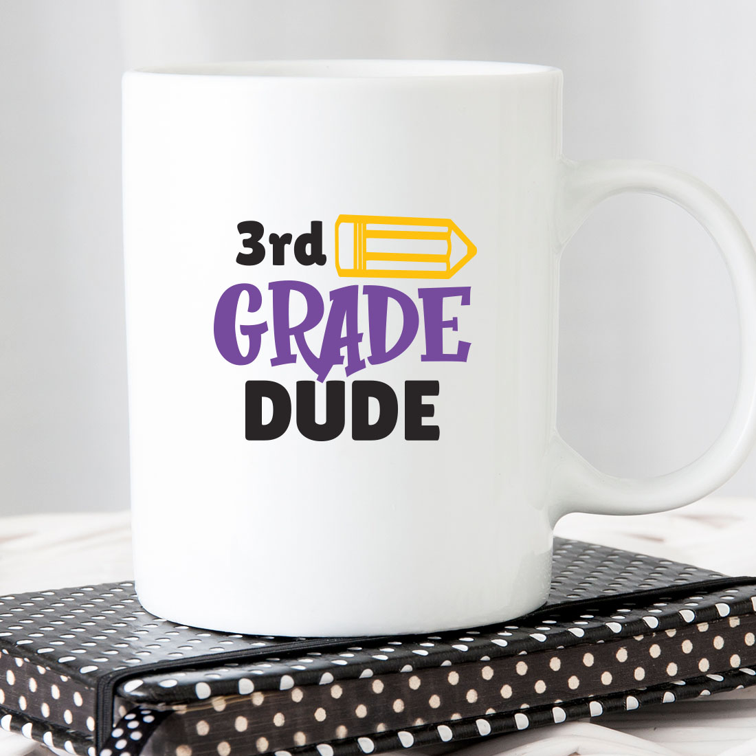 White coffee mug with the words 3rd grade dude on it.