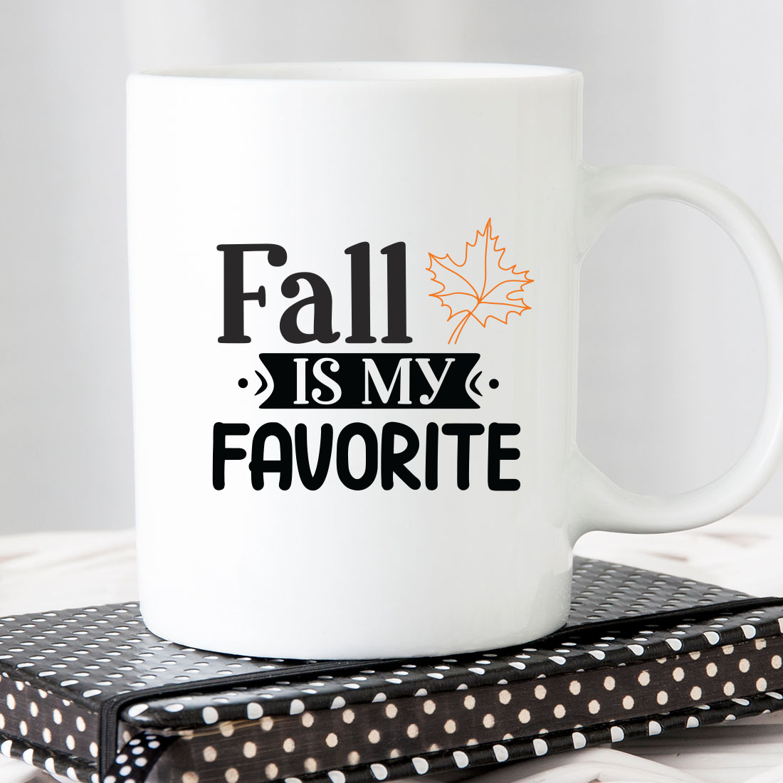 White coffee mug that says fall is my favorite.