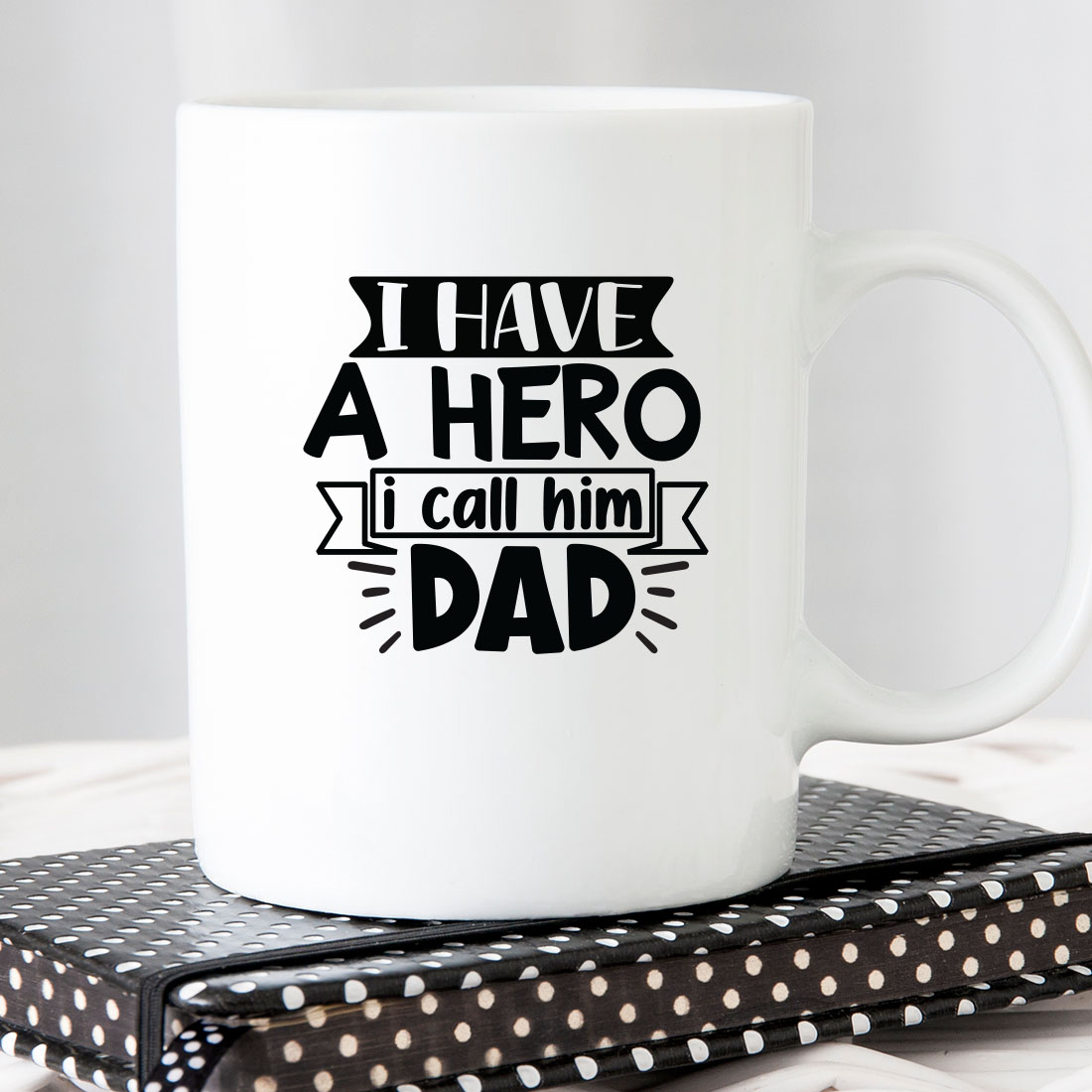 White coffee mug that says i have a hero i call him dad.