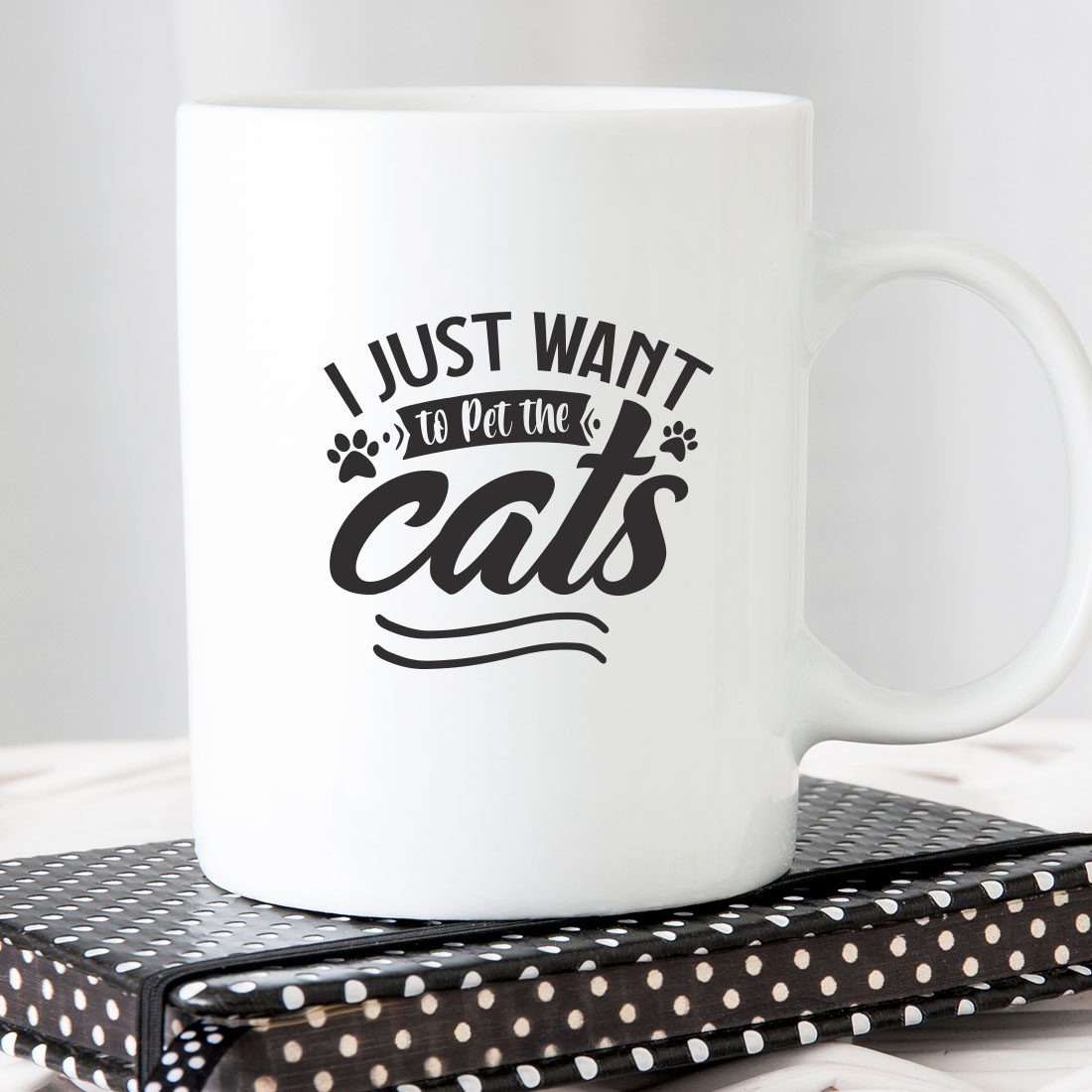 White coffee mug that says i just want to pet the cats.