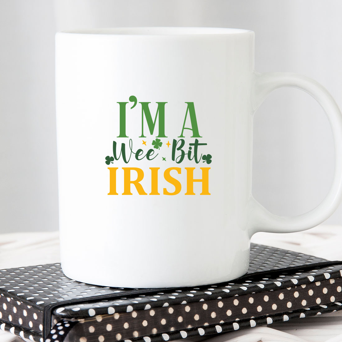 White coffee mug that says i'm a wee bit irish.