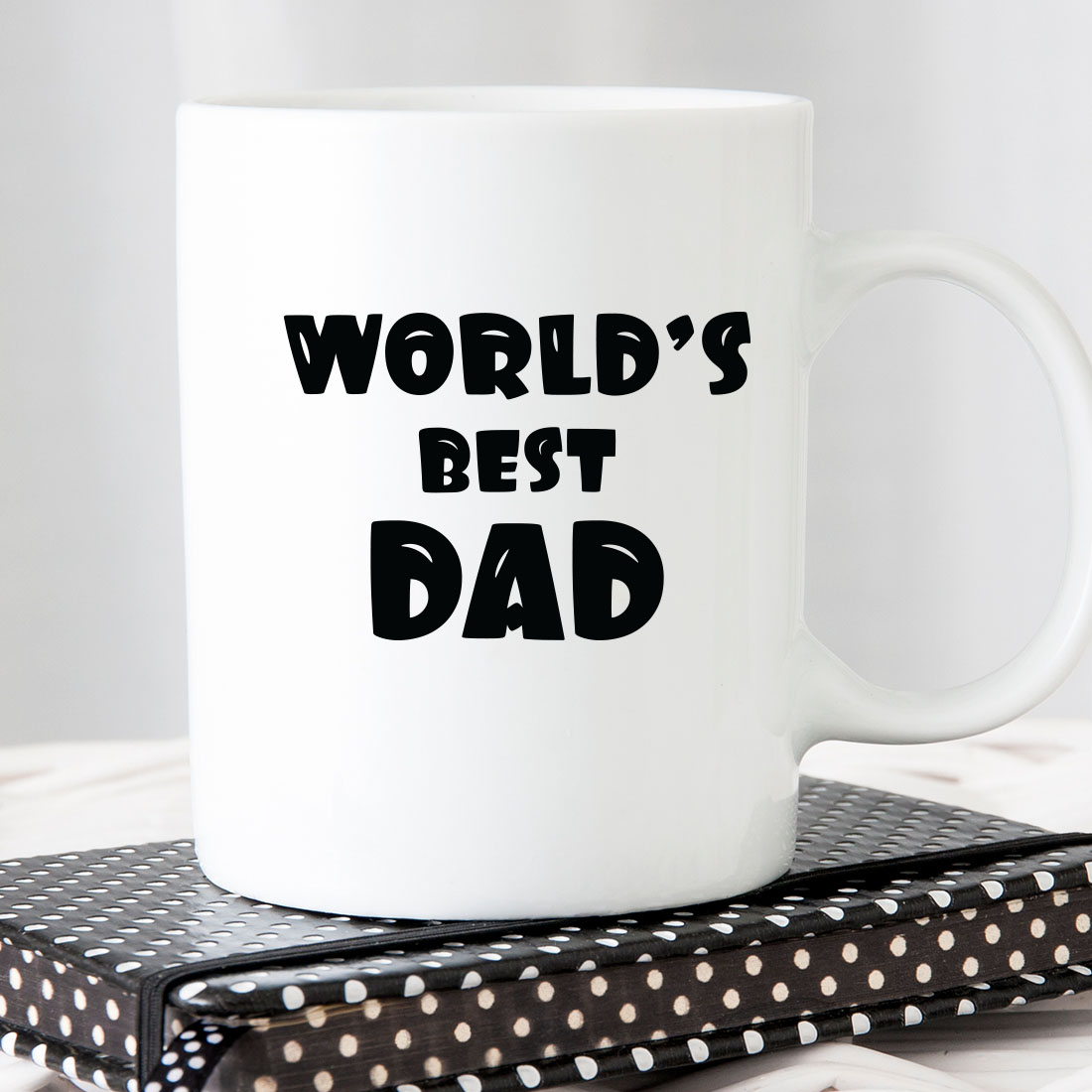 White coffee mug with the words world's best dad on it.