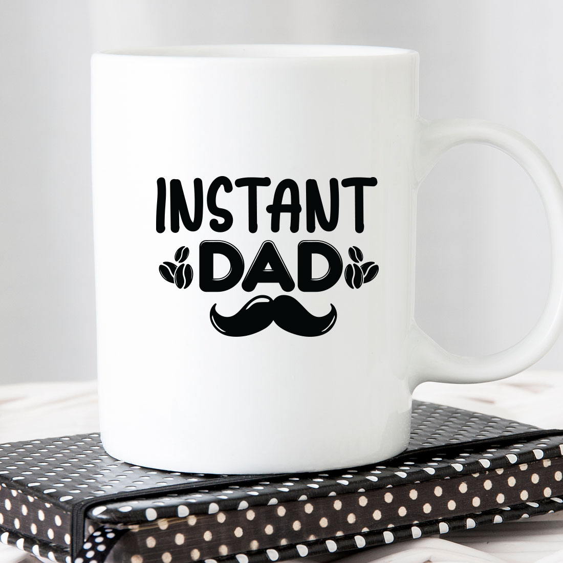 White coffee mug with the words instant dad on it.