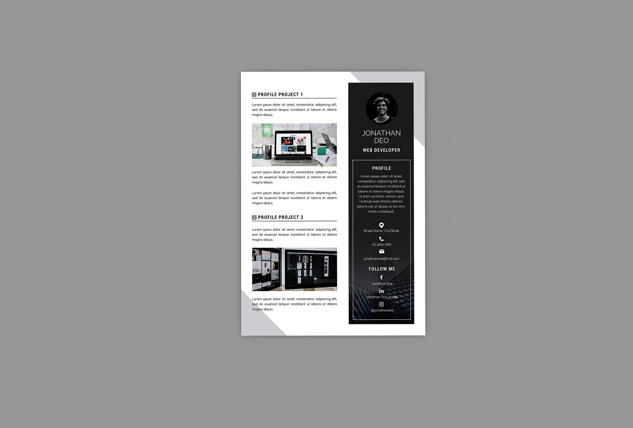 Black and white brochure on a gray background.