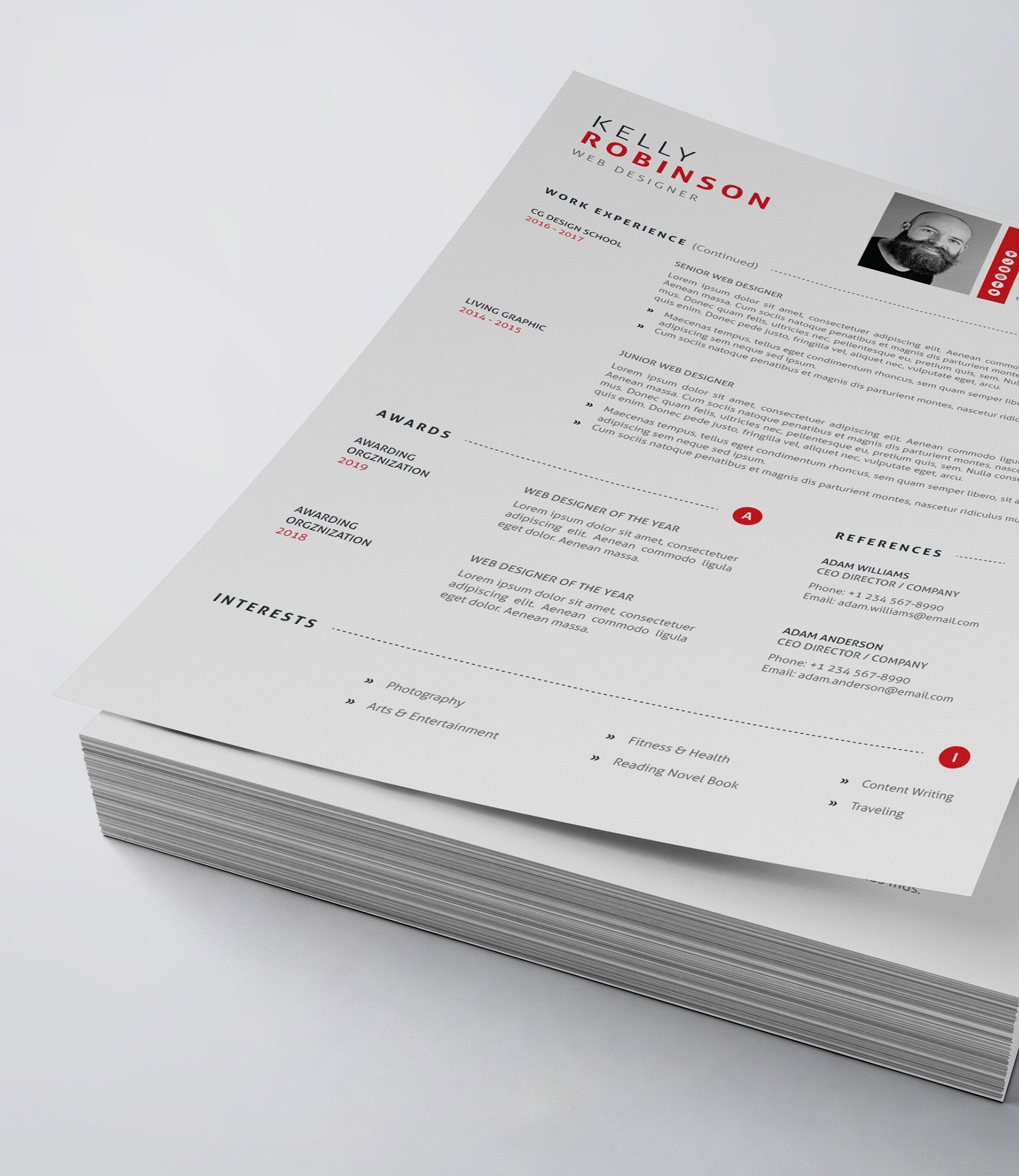 White and red resume on top of a stack of papers.