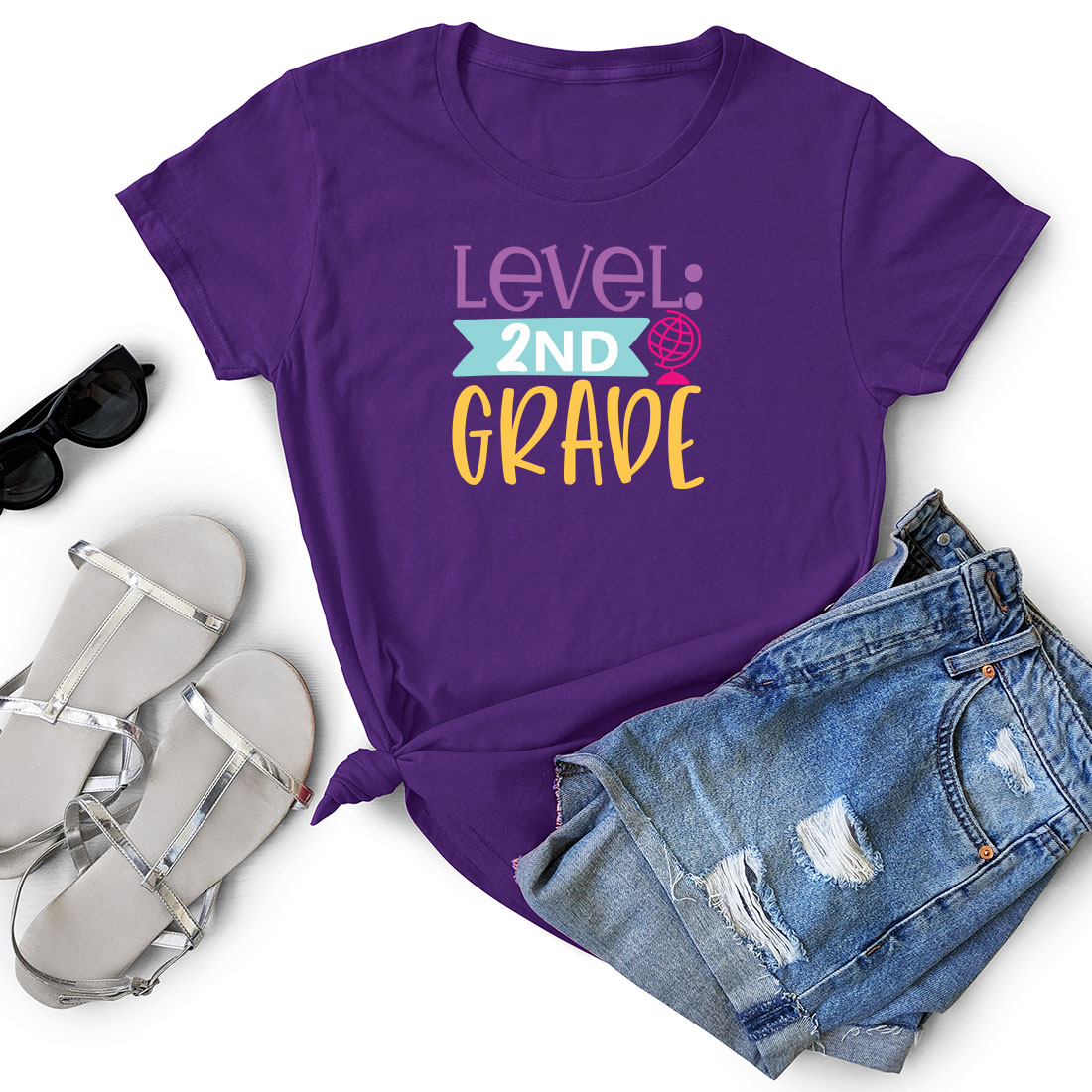 T - shirt that says level 2nd and grace next to a pair of shorts.