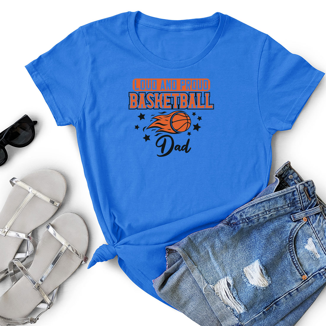 T - shirt that says basketball dad next to a pair of shorts.
