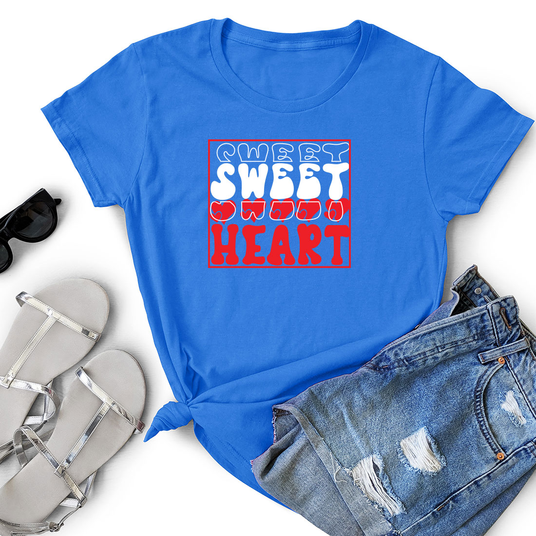 T - shirt that says sweet sweet heart next to a pair of shorts.