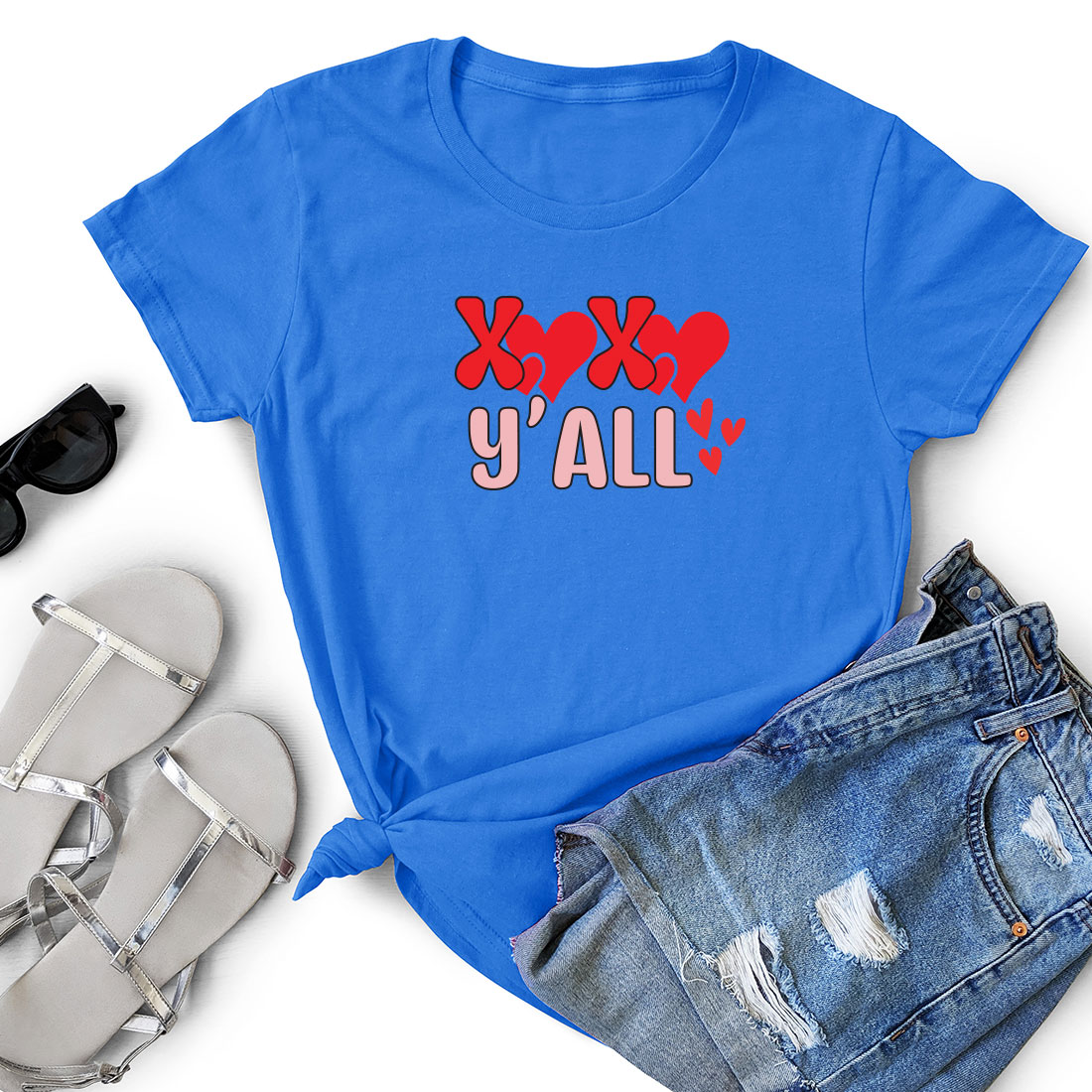 T - shirt that says y'all with hearts on it.