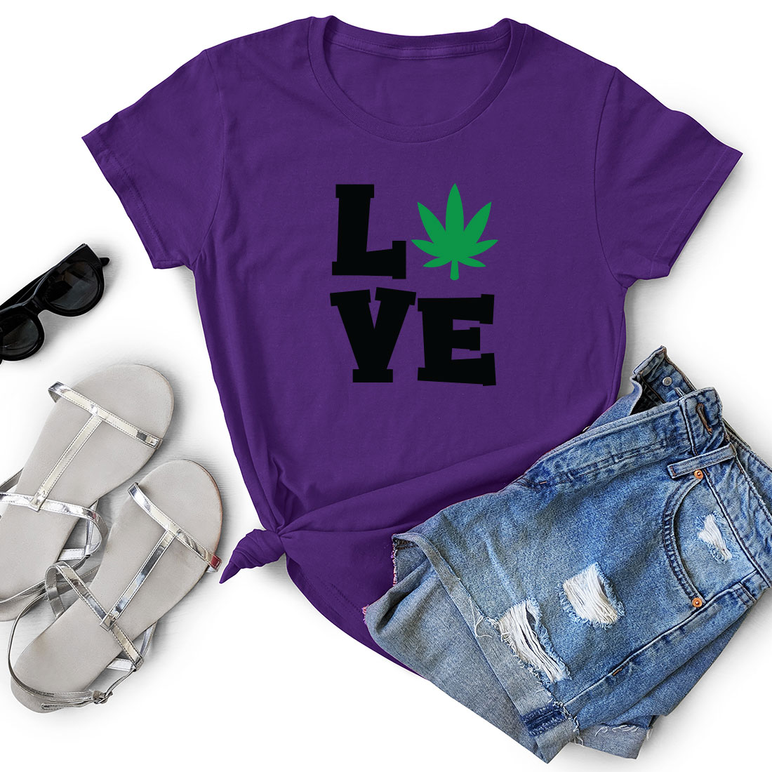 T - shirt that says love with a marijuana leaf on it.
